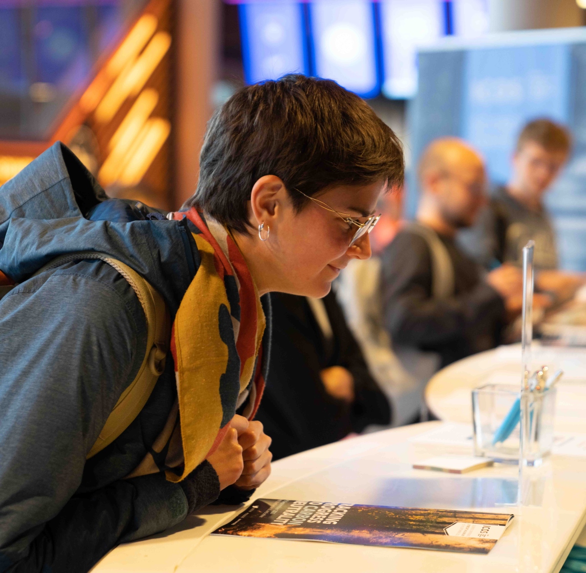 Attendee registering for the conference