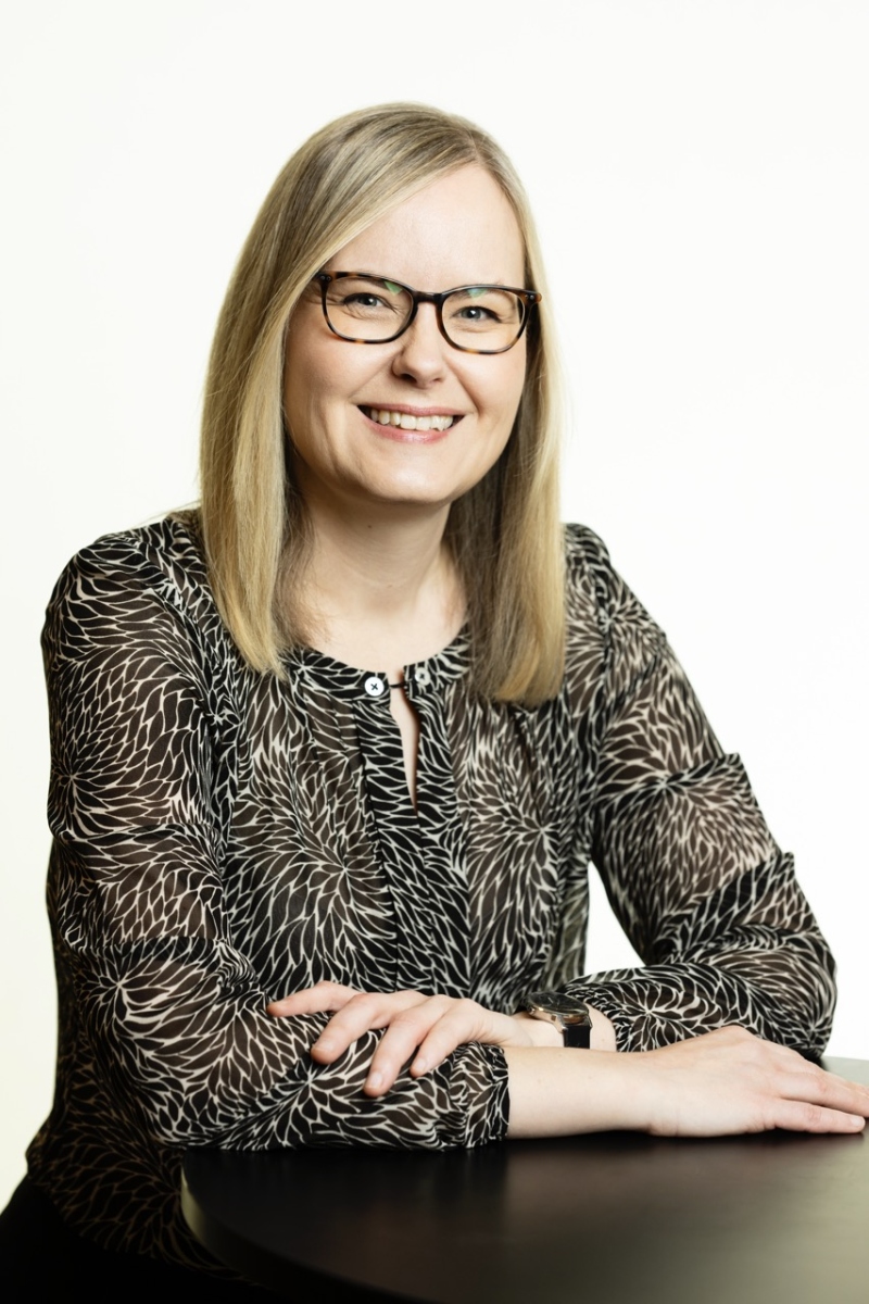 picture of Hannele Korhonen smiling and looking at the camera