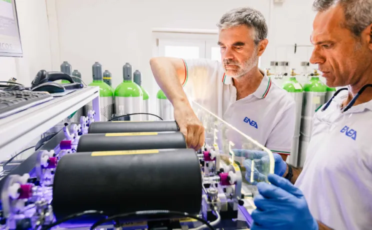 Scientists with a flask sampler